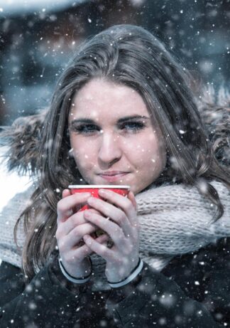 Woman with Warming Winter Coffee - Just Cool Stock Images and Animations at Budget Price